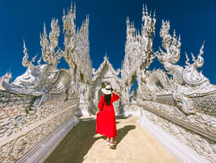 Tourist entering White Temple in Chaing Rai