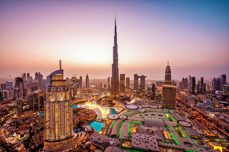 Admire the stunning architecture of the iconic attractions of Dubai at sunset