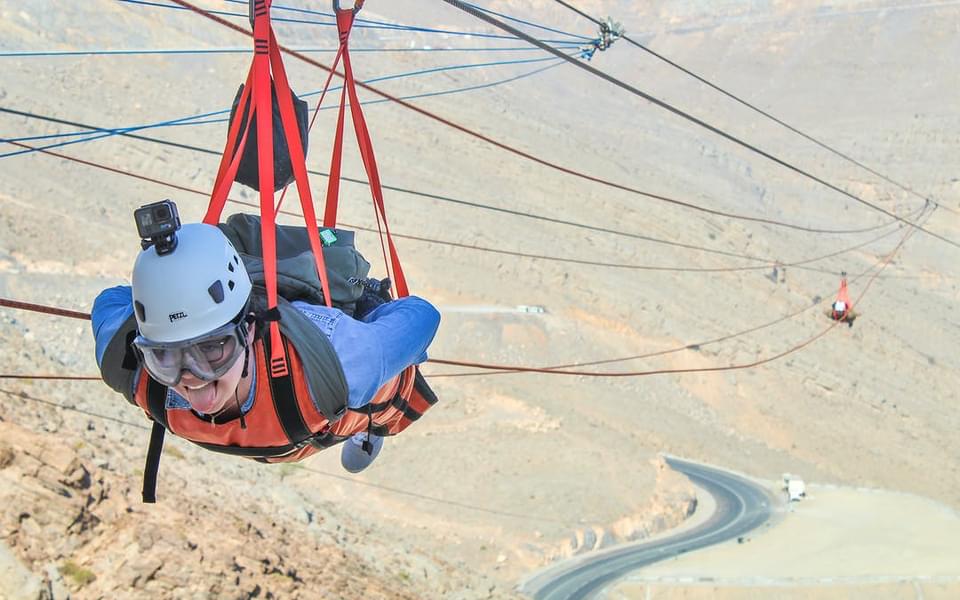 Soaring above the Hajar Mountains on the world's longest zipline at Jebel Jais