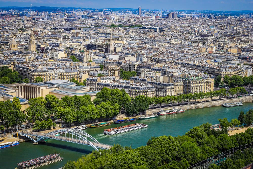 Take in the breathtaking skyline of the city from the top of the Eiffel Tower