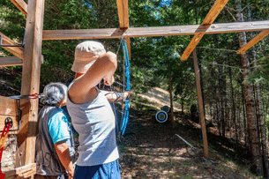 Take aim and hit the bullseye with 10 archery shots