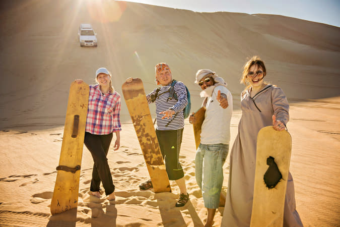 Sand surf your way through the Arabian Desert