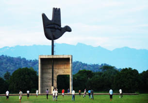 Marvel at The Open Hand Monument, symbolizing peace and unity in Chandigarh