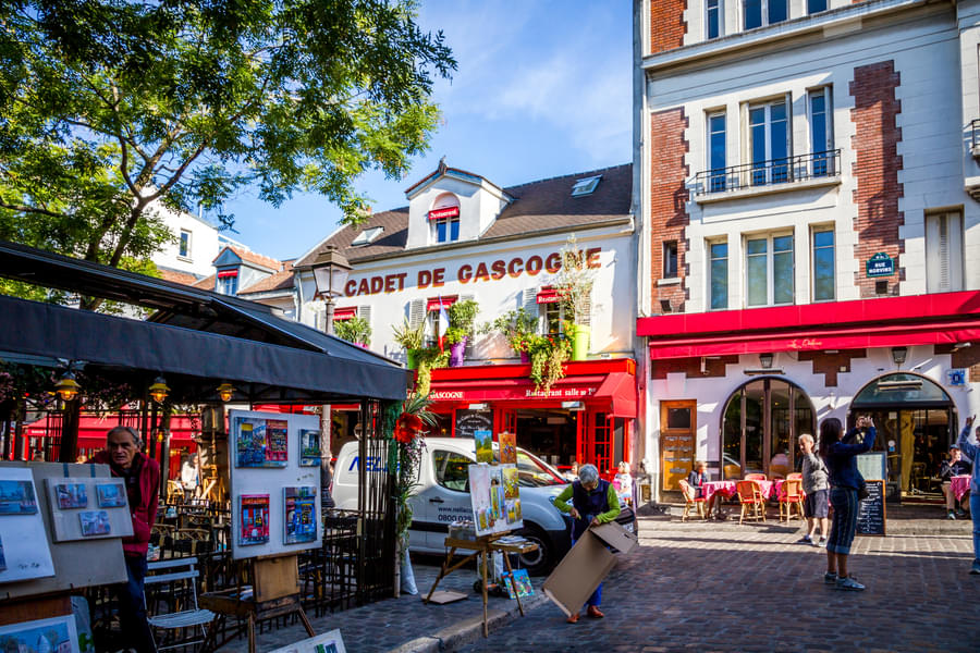Stroll through famous streets like the Place du Tertre in Montmartre