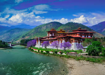 Marvel at the stunning views of the Punakha Dzong, situated at the confluence of Pho Chu and Mo Chu River 