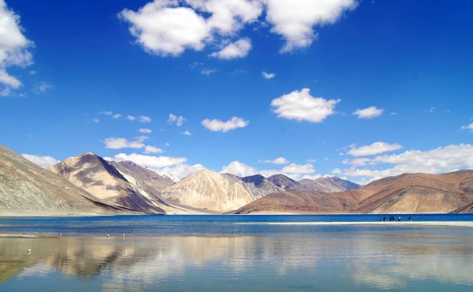  Pangong Lake is a breathtaking natural wonder, where the colors of the sky and water blend into one. 