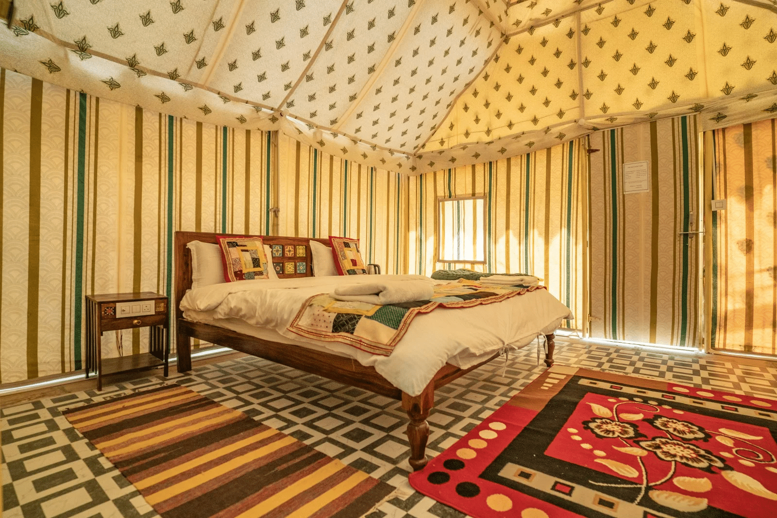 Enjoy staying in cosy tents with modern amenities while camping in Jaisalmer