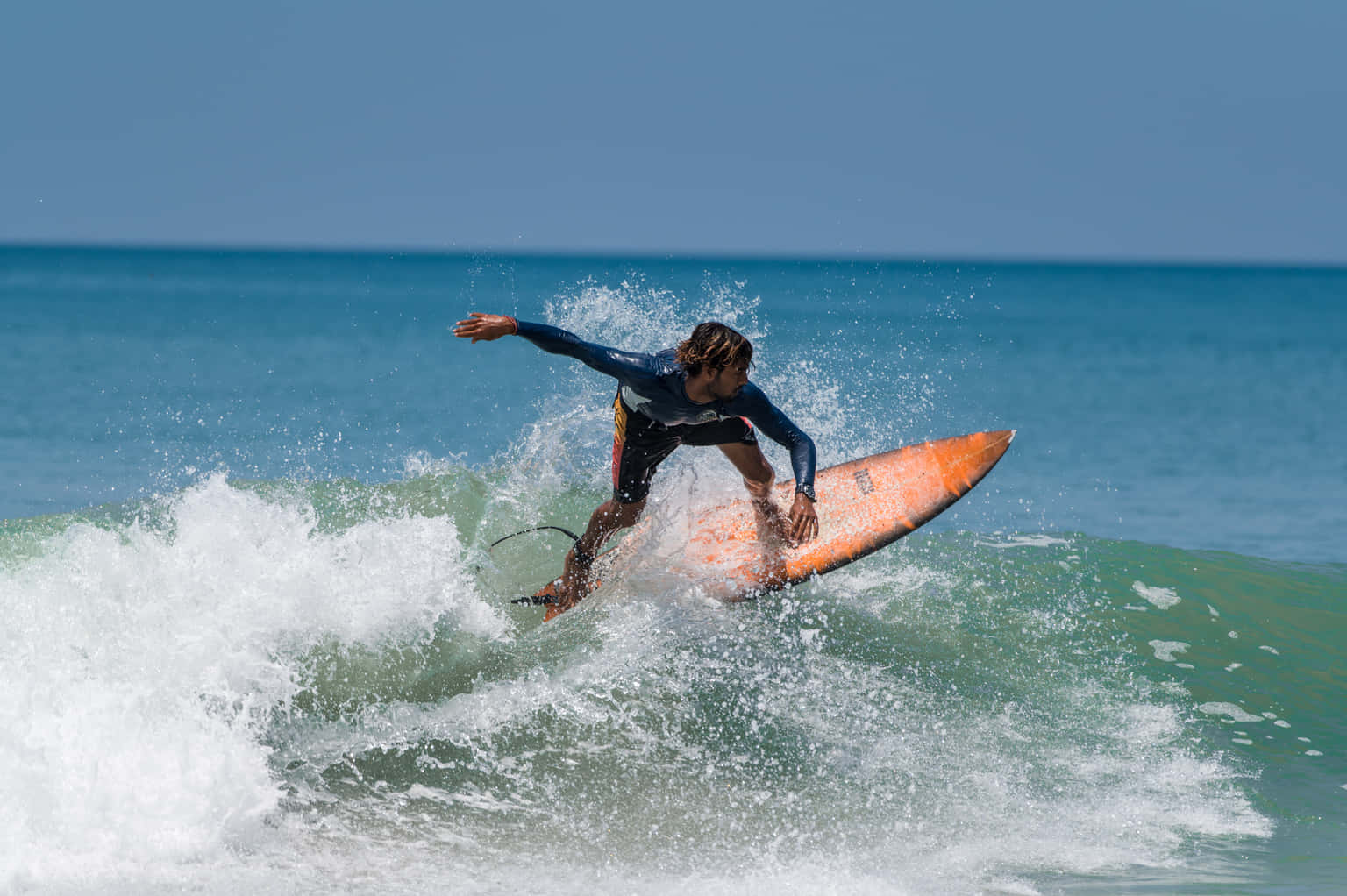Surfing at Mandrem Beach, North Goa
