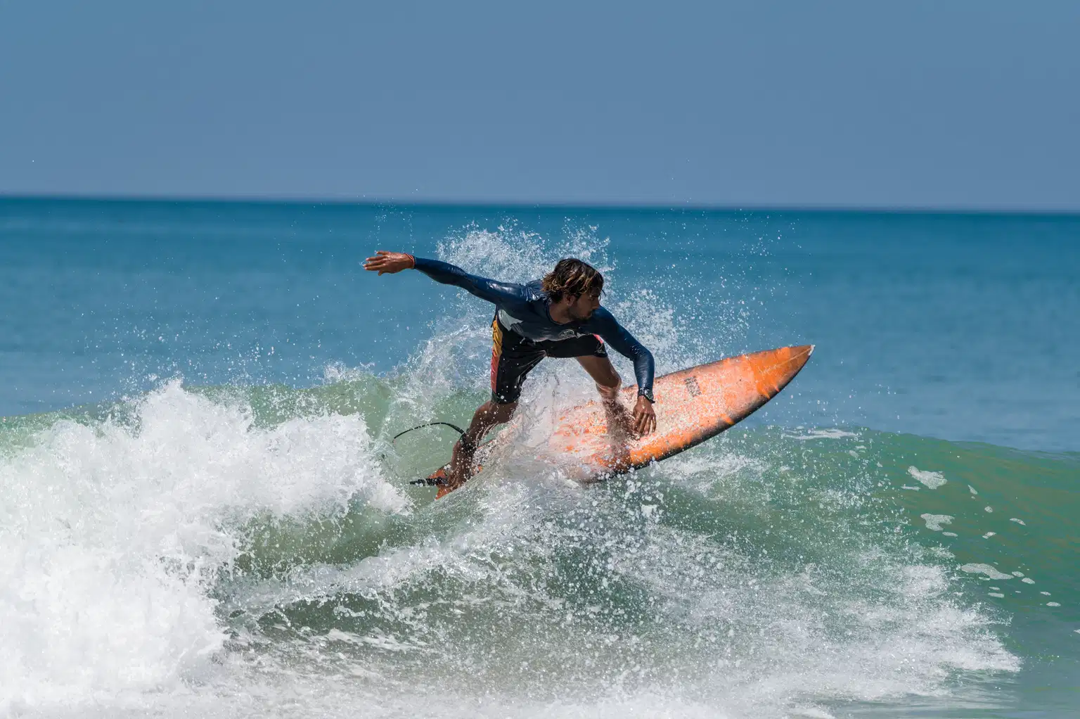Surfing at Mandrem Beach, North Goa