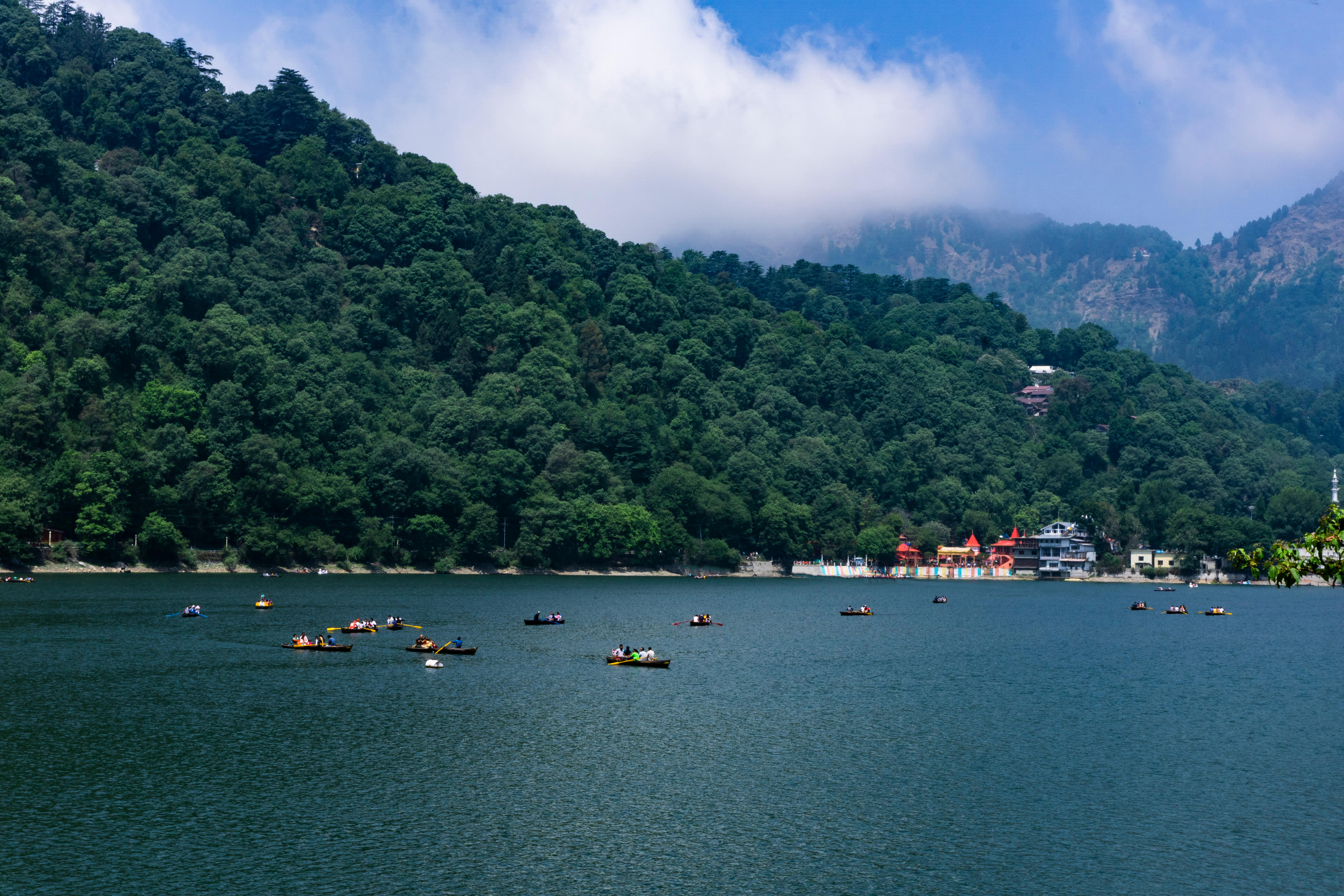 Escape to the tranquil haven of Nainital, and marvel at the misty mountains and sparkling waters of Naini Lake