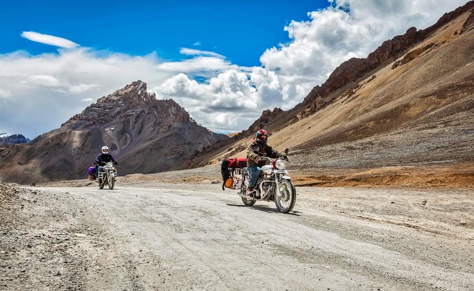 Explore the rugged terrain of Leh on two wheels amidst the ascending heights and winding roads. 