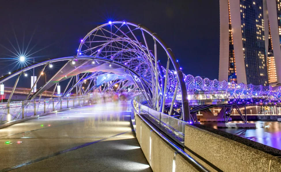 Take a stroll on the iconic Helix Bridge in Singapore