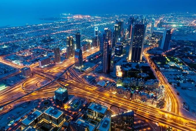 Immerse yourself in the stunning view of dazzling city lights from the top floor at Night