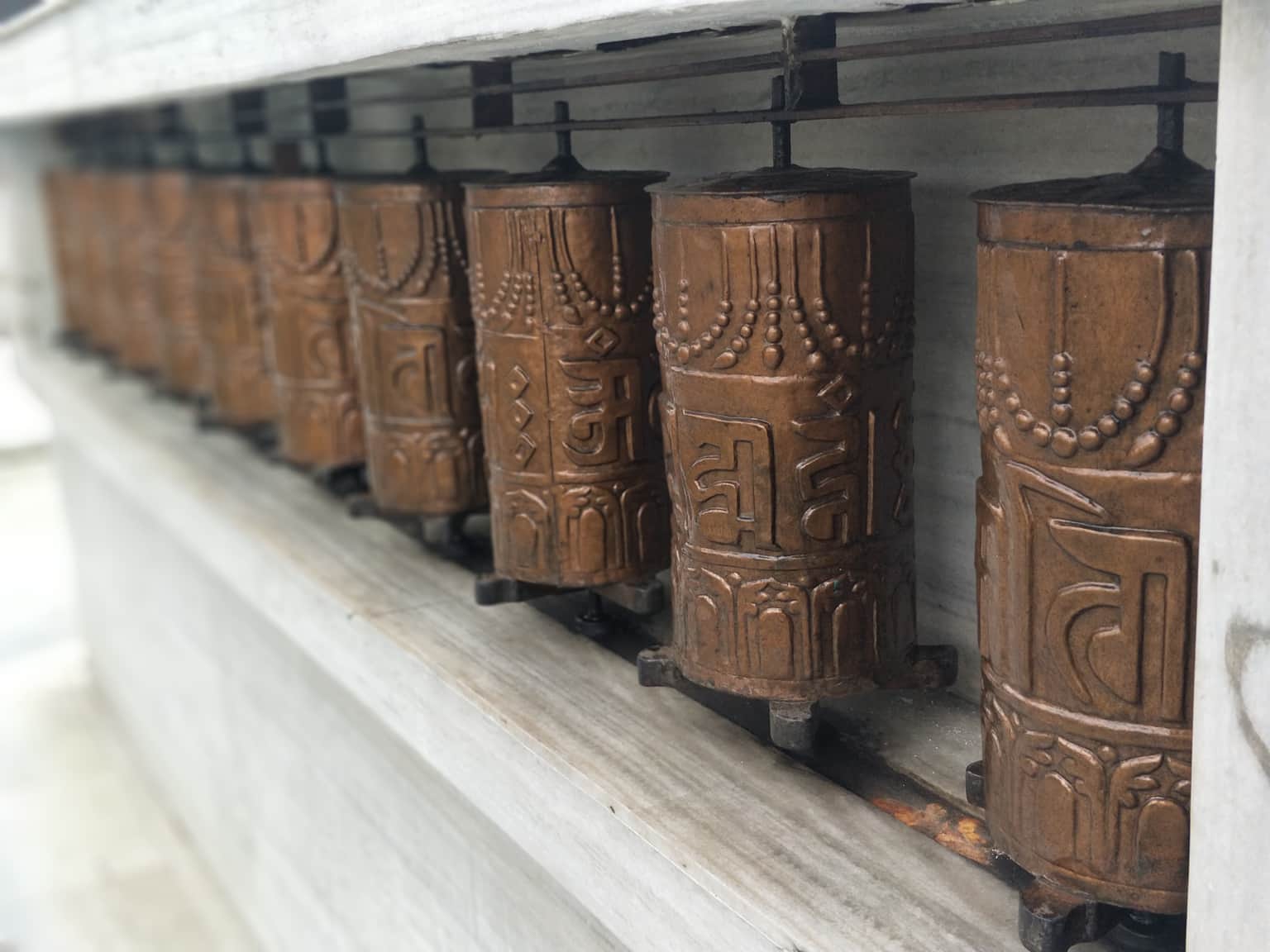 Send wishes by turning prayer wheels