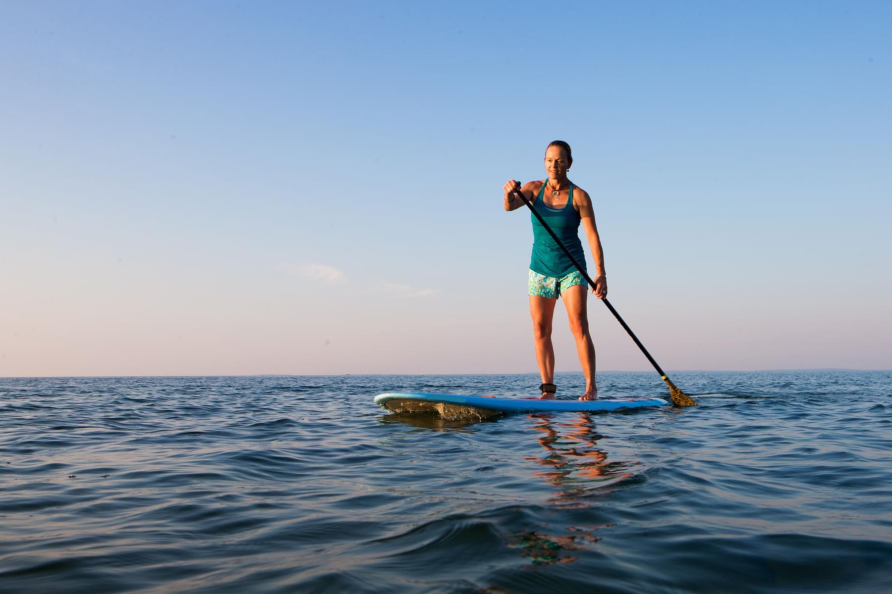 Try Paddle-Boarding at Ola Beach Club