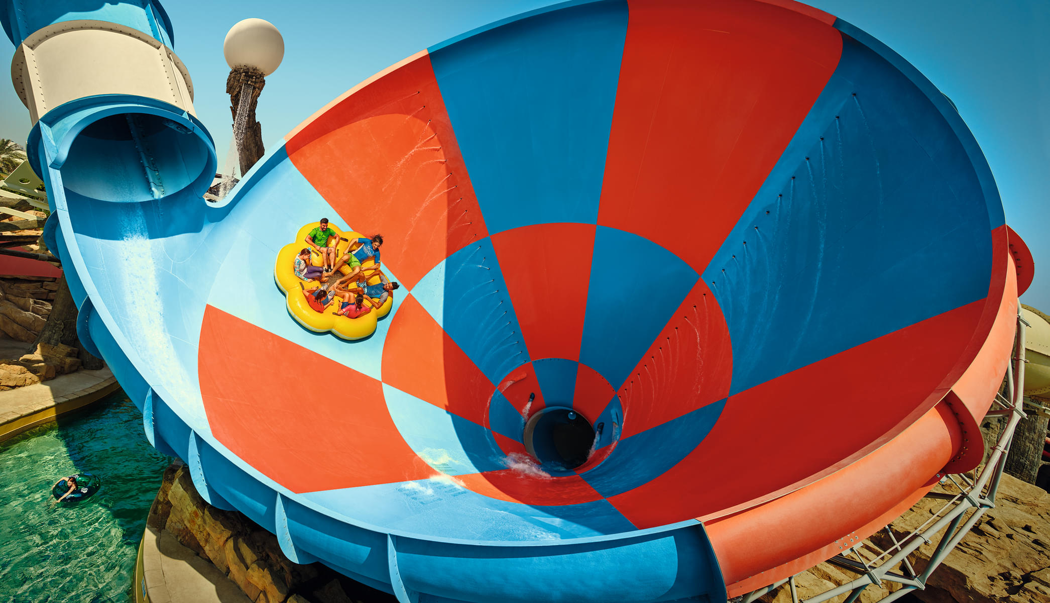 Plunge down the towering Dawwama waterslide, defying gravity and embracing the ultimate rush