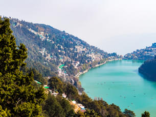 The crescent shaped Naini Lake dotted with colourful boats
