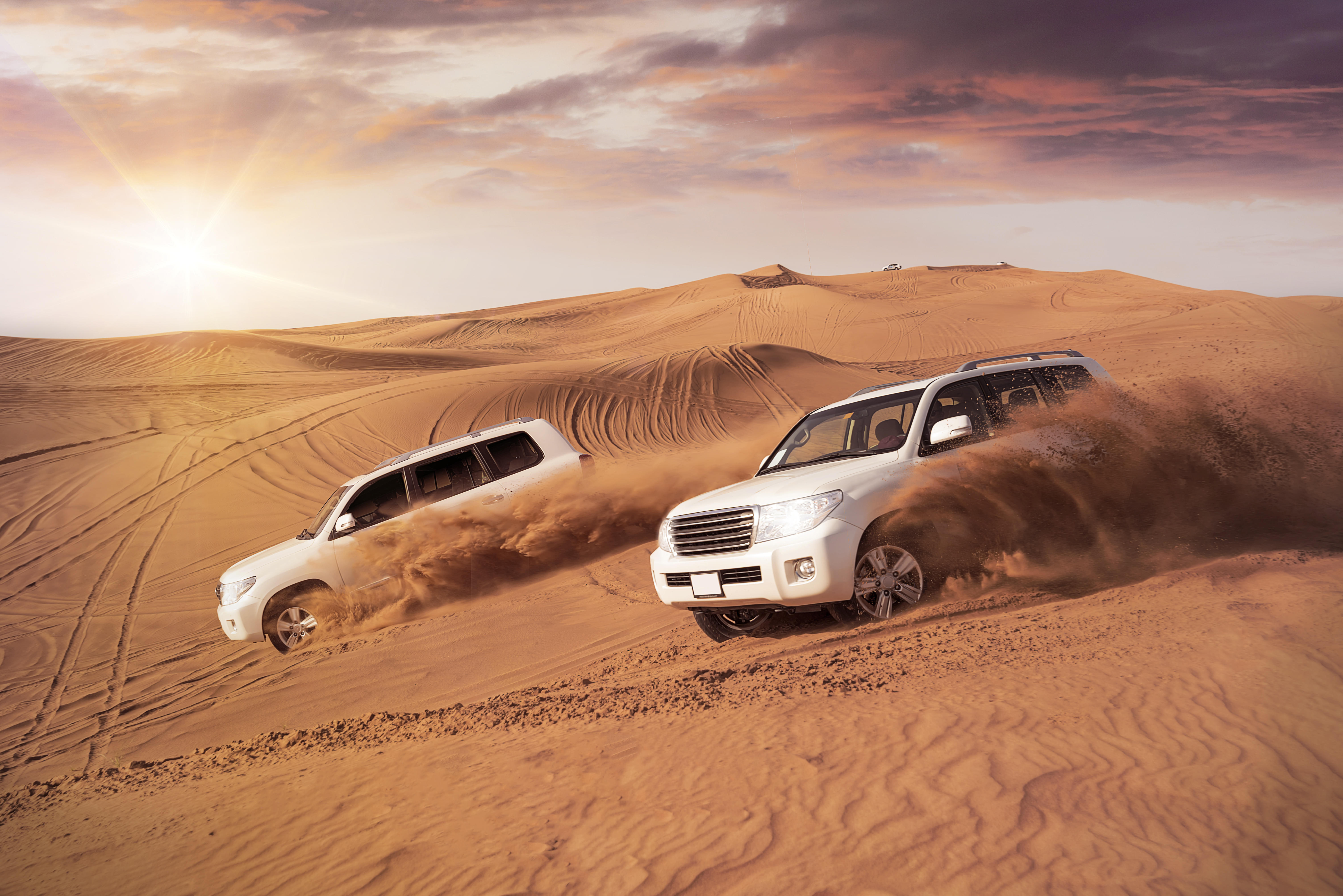 Hold on tight for an exhilarating ride through Dubai desert's golden sand dunes 