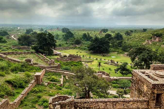 Capture breathtaking views from the fort's ramparts during your 12-hour day trip to Bhangarh from Jaipur