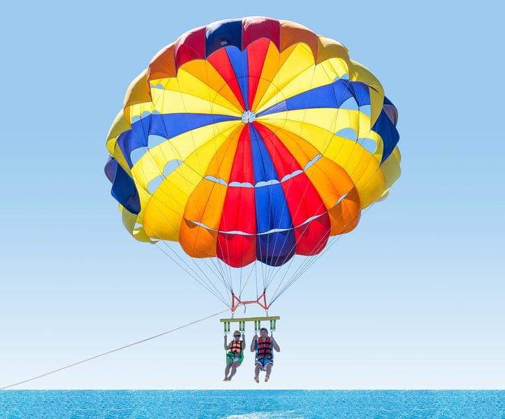 People doing Parasailing in Bali