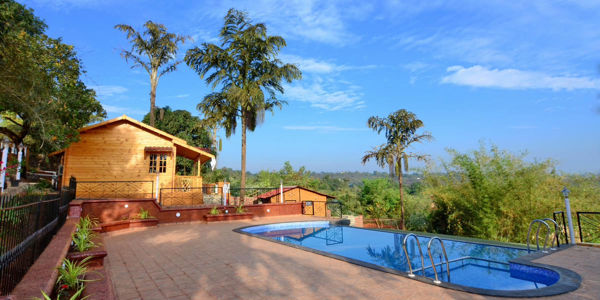 A Wooden Vacation Retreat with Serene Lake views in Goa Image
