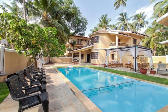 A Pool Villa Surrounded By Coconut Grove In Calangute, Goa Image