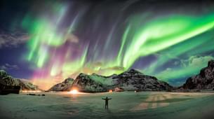 Man witnessing the stunning Aurora Borealis