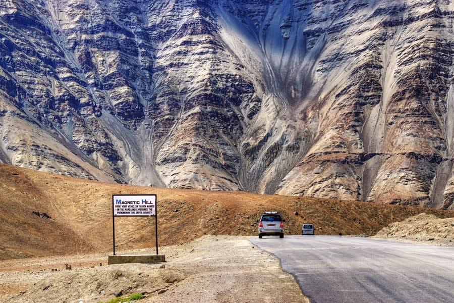 Capture the surreal and unforgettable moment of driving uphill on Magnetic Hill which is known for its gravity defying phenomenon. 