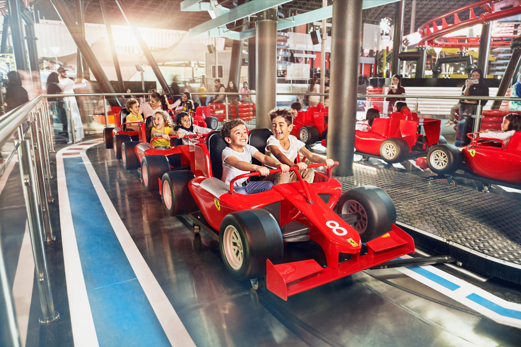 Have the adrenaline-fueled thrill of high-speed racing at the Speedway Race ride