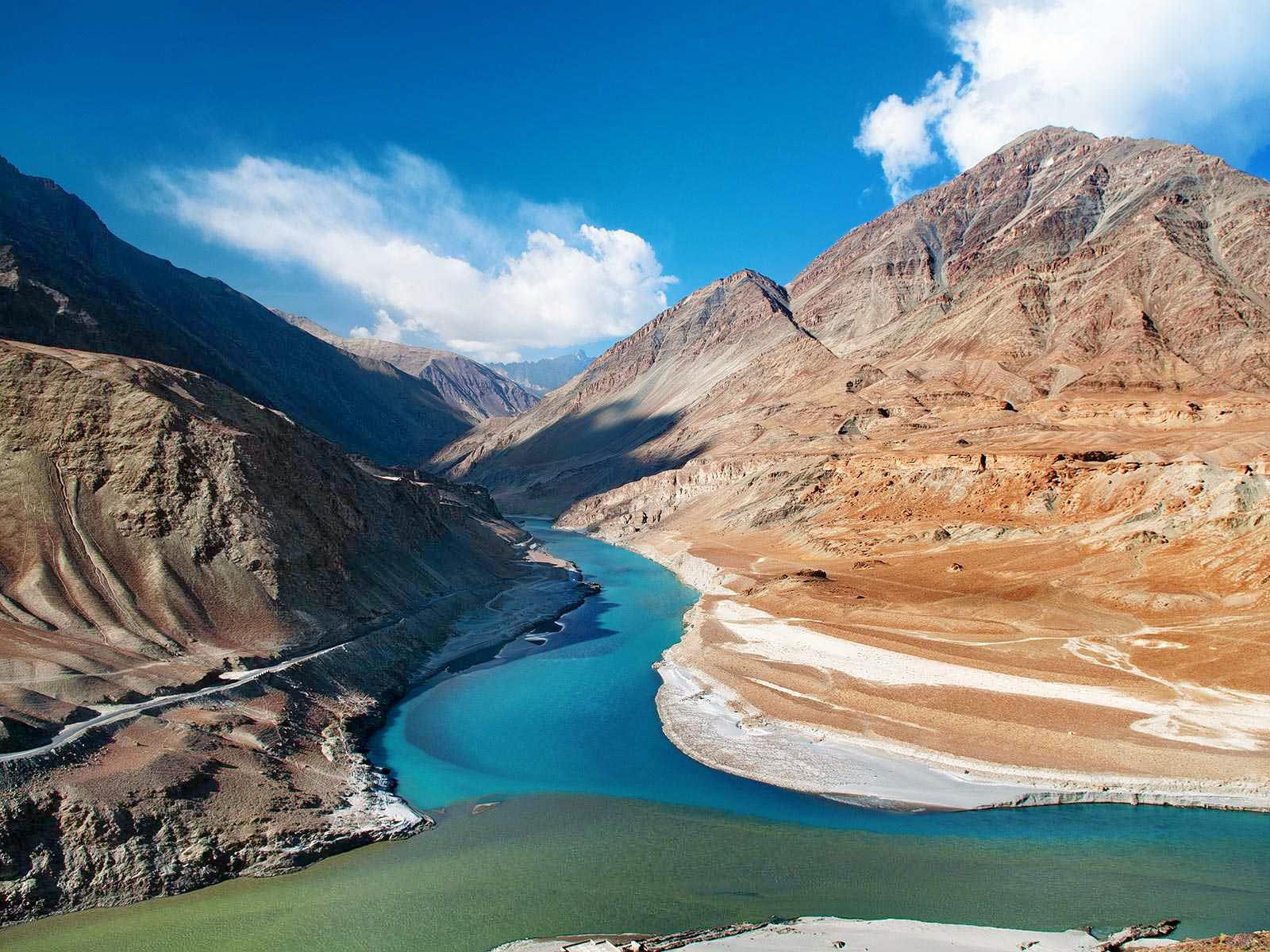 The Confluence – Indus & Zanskar - At times, at the Sangam, the Indus River can be seen as shiny blue while the Zanskar river is dirty green