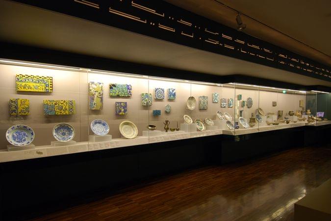 Check out pots, glazed tiles and its work in the Islamic art gallery