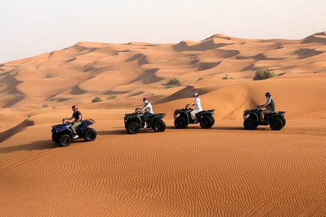 A group of friends enjoying the exhilarating quad biking experience
