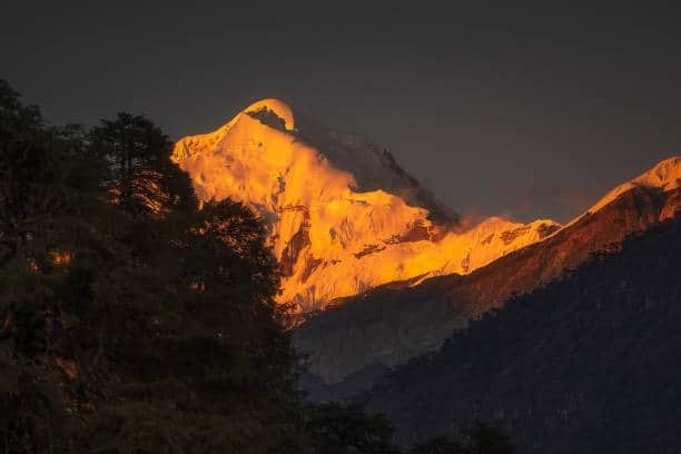 Witness Sunrise Over the Peaks