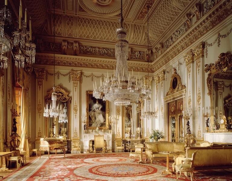 Explore Buckingham Palace's State Rooms, where opulent furnishings & priceless treasures await