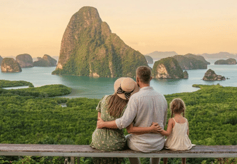 Family watching sunrise from Samet Nangshe viewpoint deck