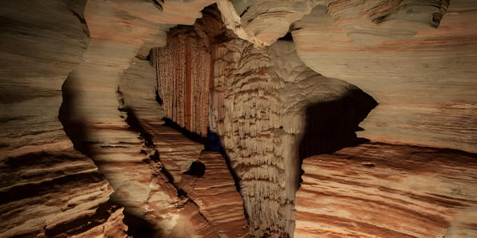 Soak-in the beauty in every dark cave turn with Headlamp and life jackets provided