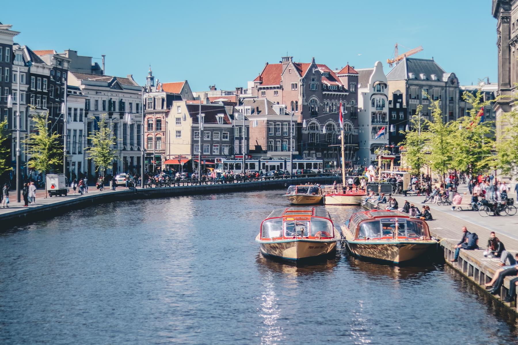 Amsterdam open boat Canal Cruise - live guide from Anne Frank House