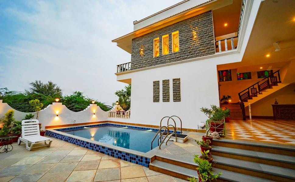 A Luxurious Villa Amidst Lush Green Aravali Hills In Udaipur Image
