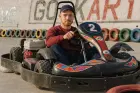 Navigate the track, feeling adrenaline rise with every twist and fast turn