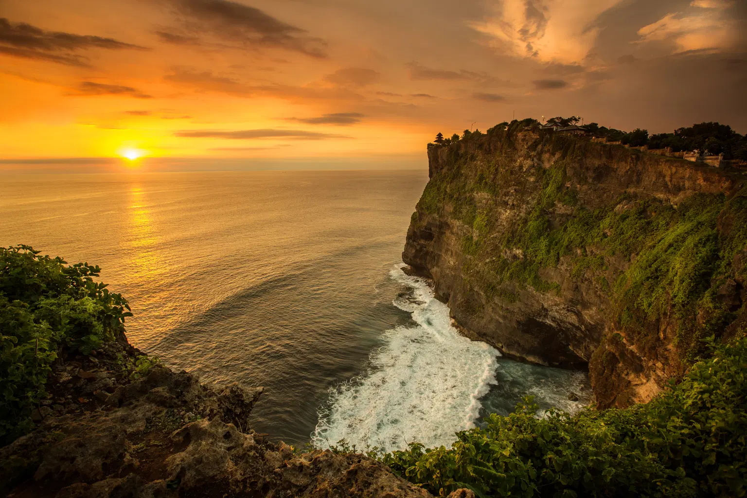 Watch beautiful sunset from Uluwatu Temple
