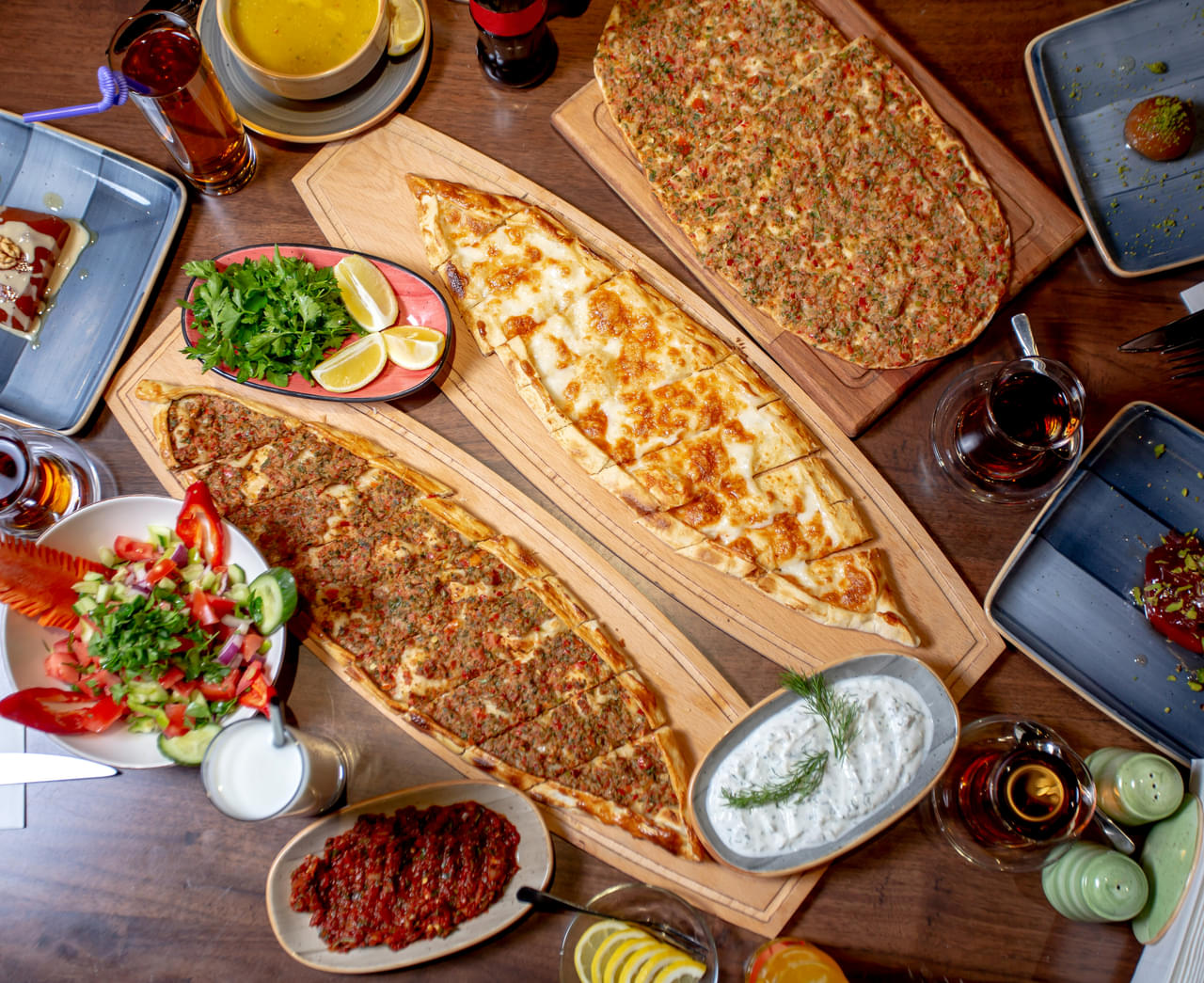 Pide and lahmajun served with salad