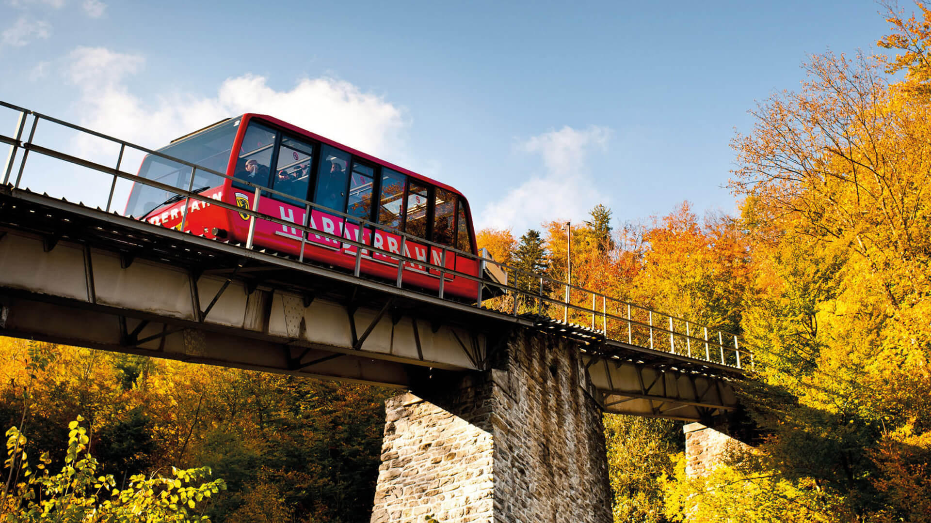 Enjoy the scenic beauty around you during the funicular ride from Interlaken to Harder Kulm