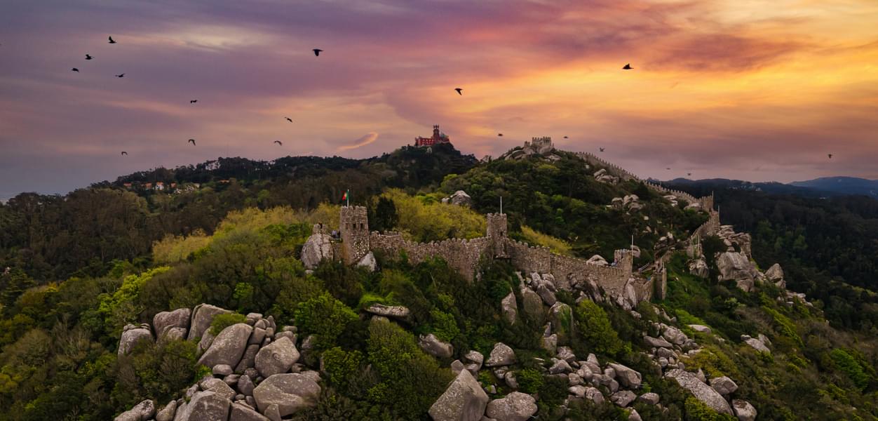 The lush green forests and the close vicinity of the surroundings of the Castle of the Moors