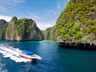 Marvel at the serenity of nature as you go on island hopping by Big Long-tail Boat 