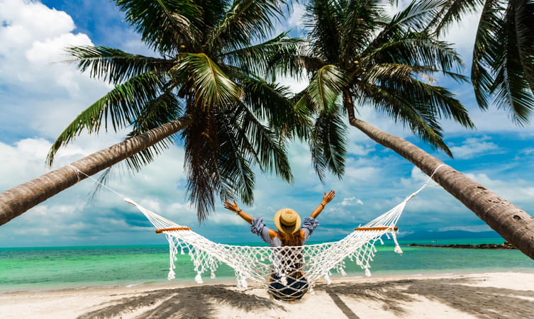 Tourist relaxing in the beach of Mauritius