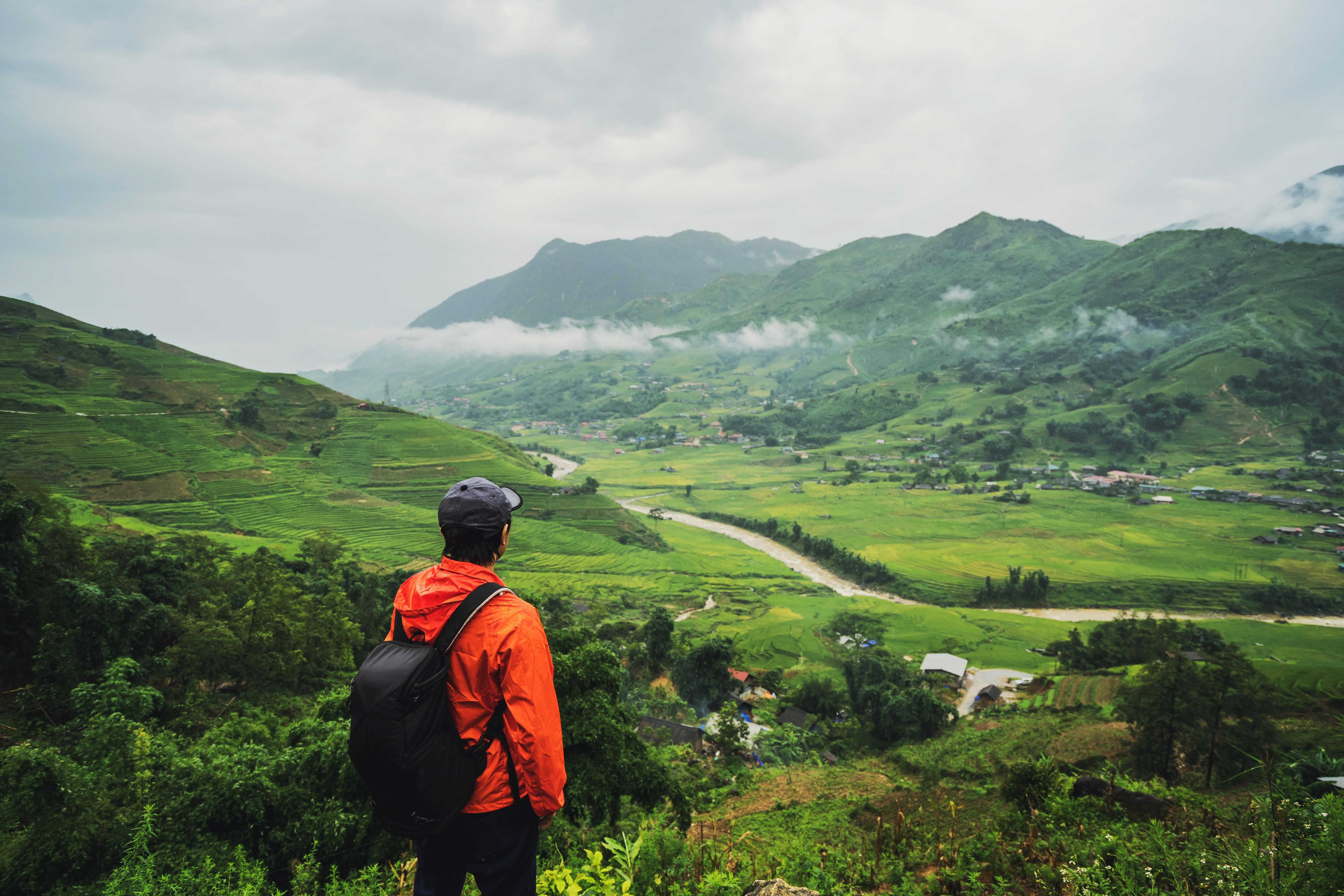 Tourists admiring the lush green landscape of Ranikhet