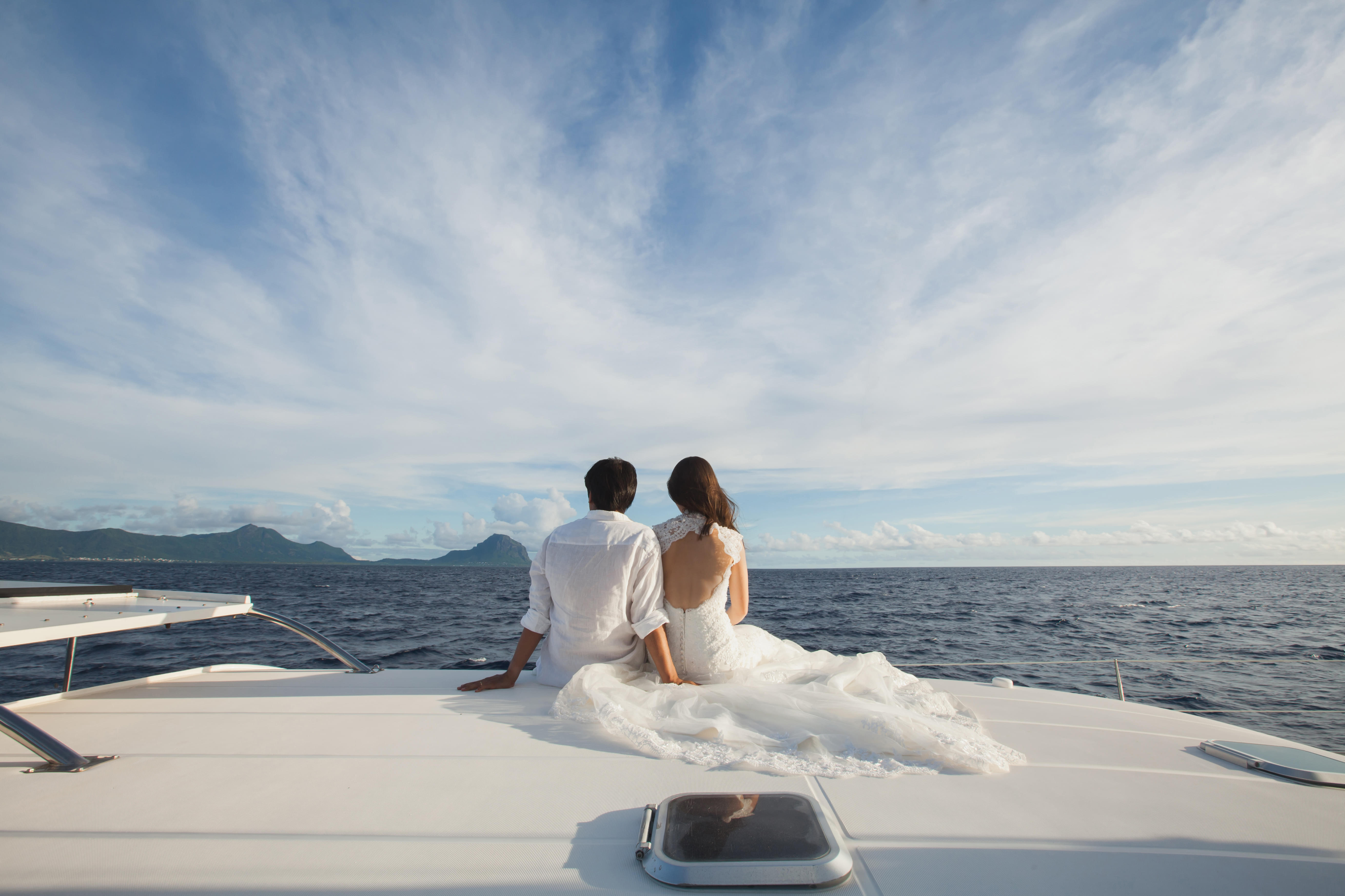 Couple enjoying the catamaran boat ride