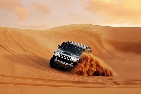 Experience the thrill of dune bashing in a luxurious Hummer H2