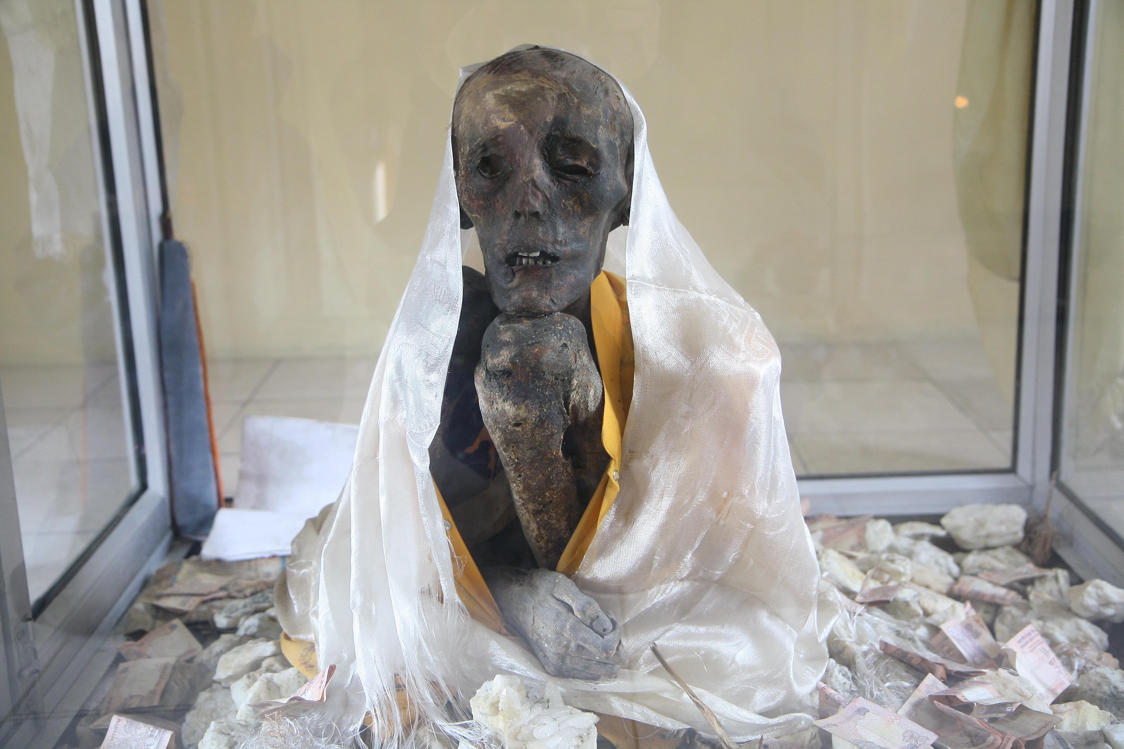 Witness the Ancient Mummy of Giu Village
