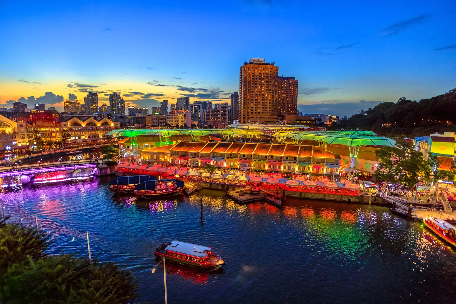 Vibrant sunset scene over Clarke Quay